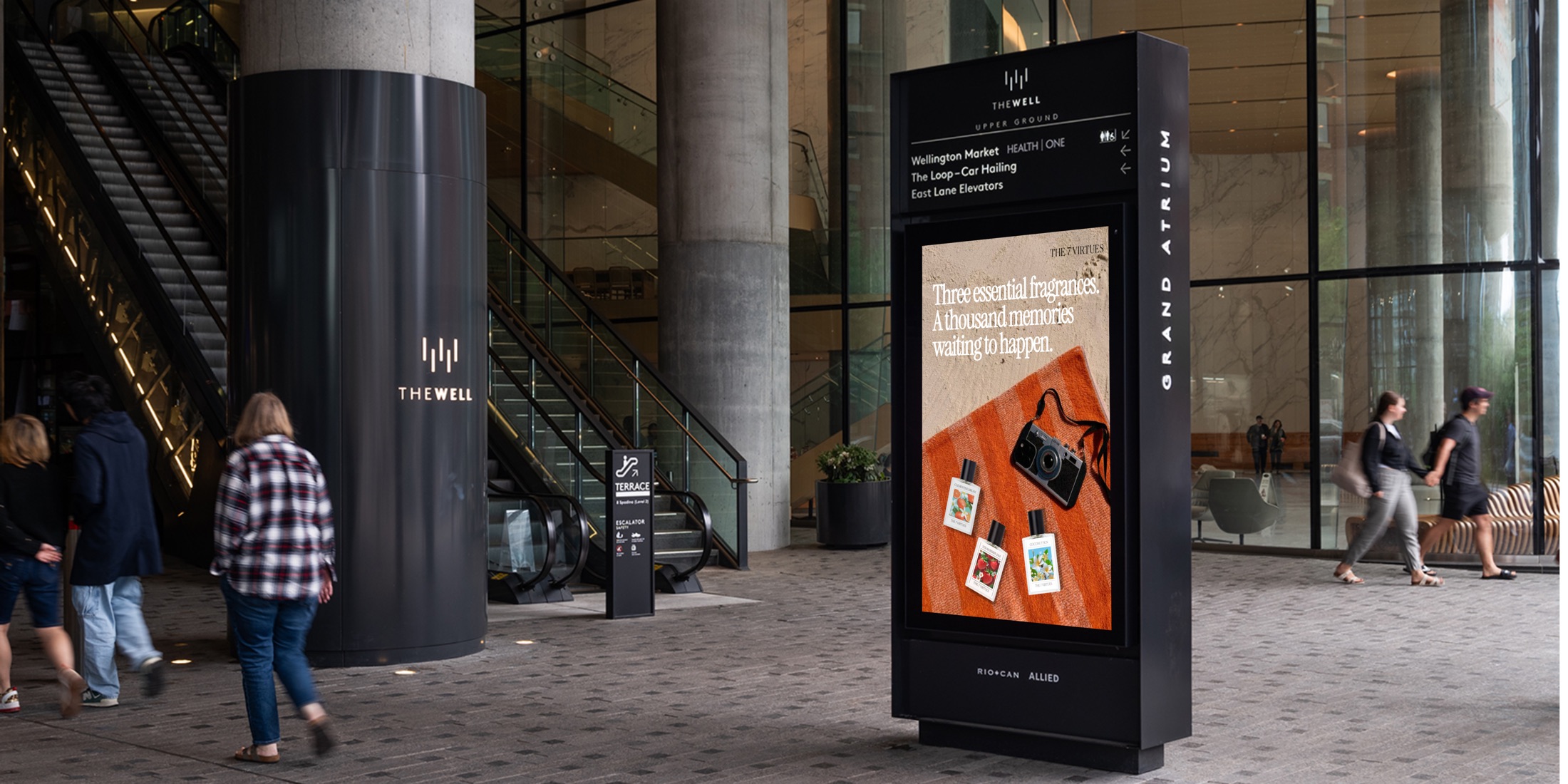 Summer Fling digital kiosk mockup at The Well atrium